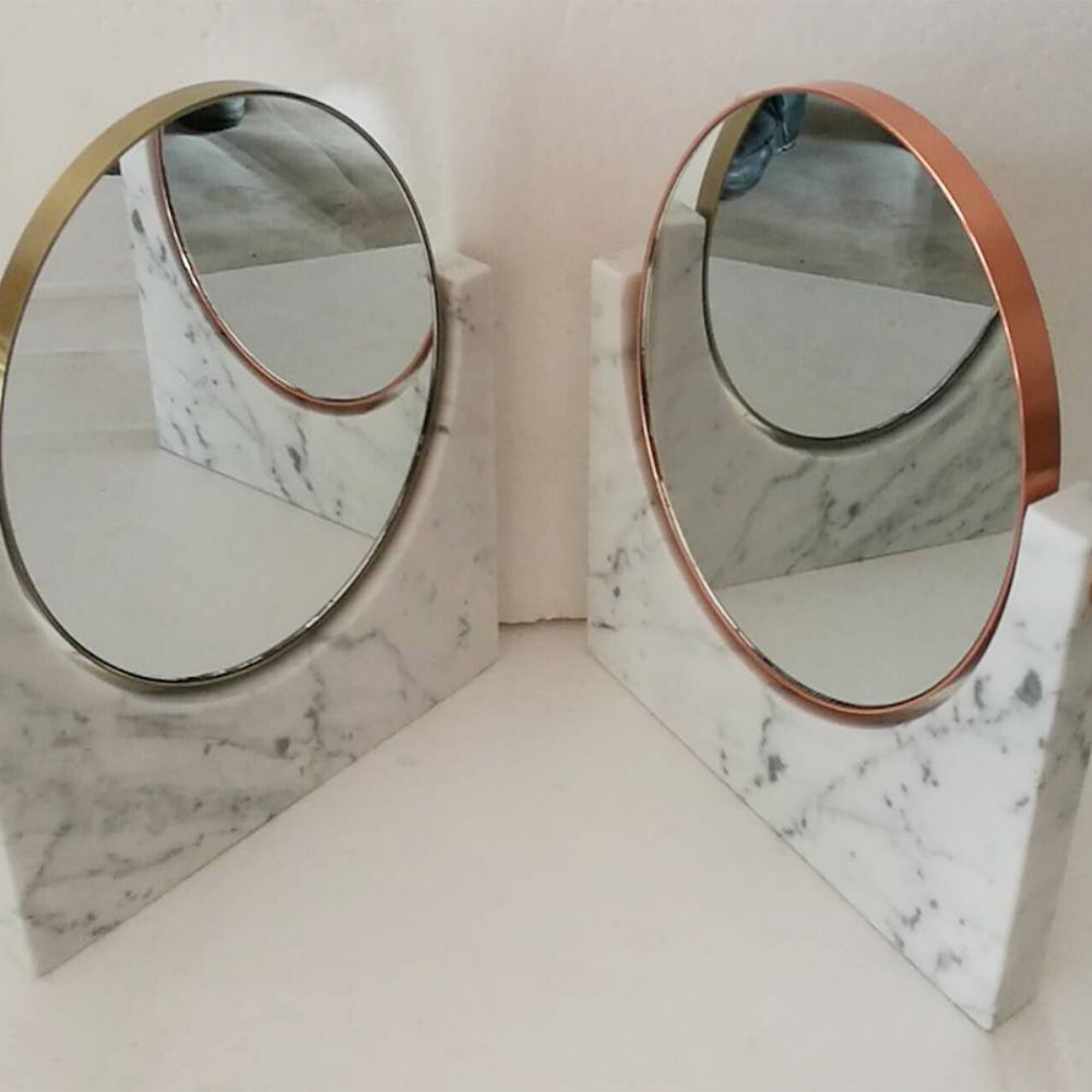Specchio rotondo in marmo