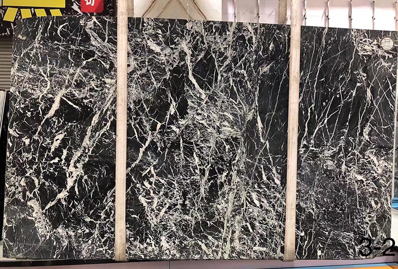 Lastre di marmo italiano nero grigio carnico